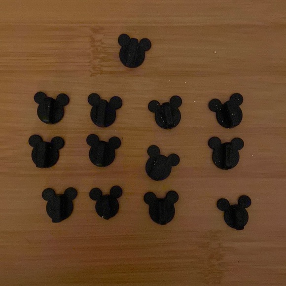 Set of 13 Disney Parks pin backs. New - Picture 1 of 3